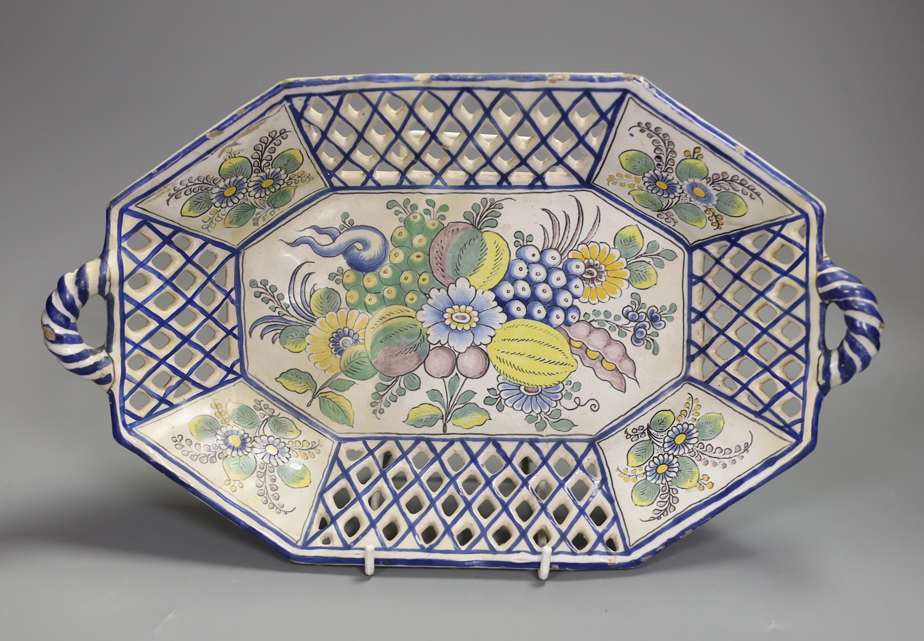 A French or German faience chestnut basket, late 18th century restored, 35cm